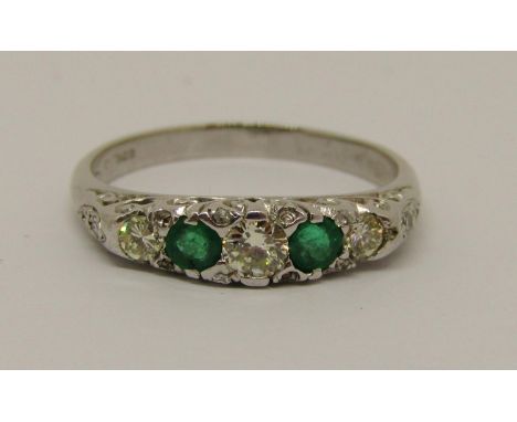 18ct white gold emerald and diamond ring, Birmingham 1990, size R, 4.1g 