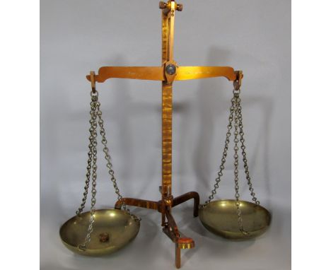 HM Stanley Ltd textured brass balance scale together with two leather heavy horse straps and brasses (3) 