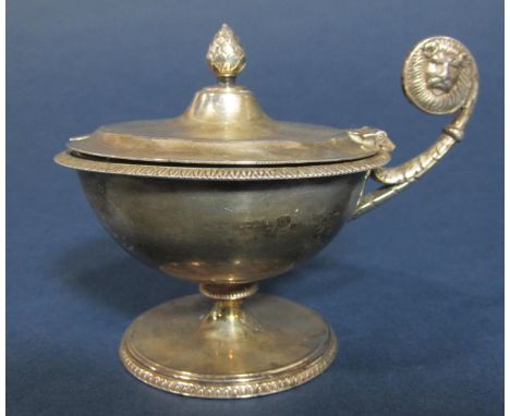 Good quality early 20th century silver pedestal mustard in the form of a lamp, with pine cone finial and unusual lion head sc