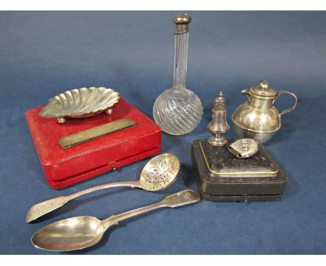 Mixed collection of silver comprising a small baluster pepper, a baby rattle, a cased scallop shell dish, a silver engine tur