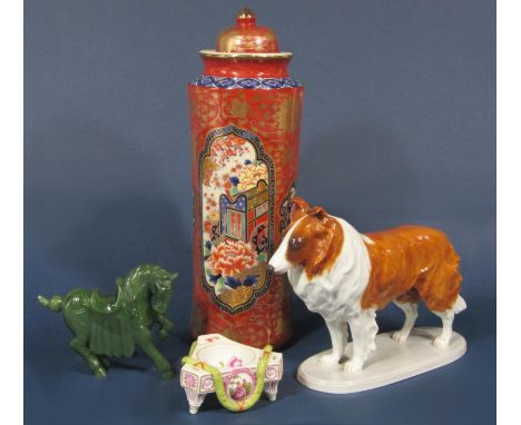 A Japanese red ground vase and cover with floral decoration to base, 36cm tall approx, together with a Heubach model of a a s