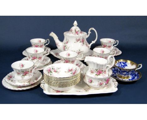 A collection of Royal Albert Lavender Rose pattern wares comprising teapot, milk jug, sugar bowl, rectangular sandwich tray, 