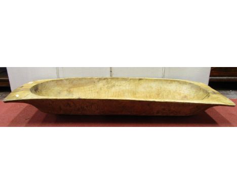 A dug out softwood trough, 125 cm in length x 40 cm wide x 20 cm depth 