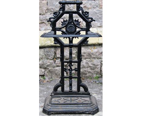 A late Victorian cast iron umbrella/stick stand with geometric and foliate detail, stamped number 1, with registration number