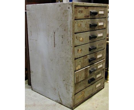 A vintage heavy gauge steel industrial eight drawer filing cabinet with painted finish and Bakelite handles, 43 cm wide x 45 