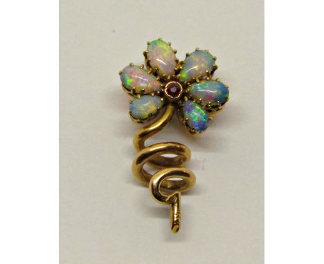 Good quality yellow metal flower head claw set with pear cut opals and a central ruby, 2.3g (section of a larger piece of jew