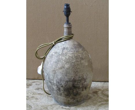 An antique ewer with drawn neck, later adapted as a lamp, 40 cm in height plus fittings 