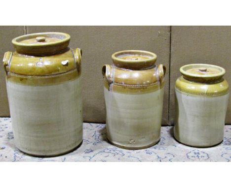 Three vintage glazed stoneware preserve jars and covers of varying size 