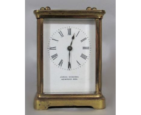 A brass carriage clock by James Osborne of Newport, Mon. Platform escapement, 11cm H x 8cm W x 6cm D 