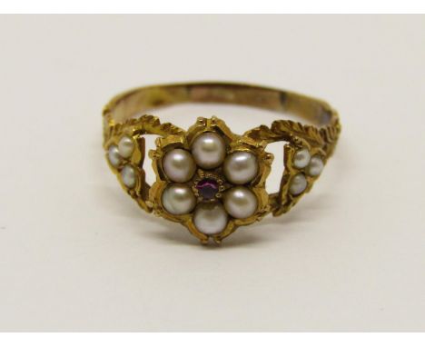 19th century yellow metal mourning ring set with split pearls, with glazed compartment to interior, size K, 1.7g 