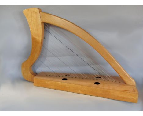 22 string lap harp, 71cm high x 48cm wide 