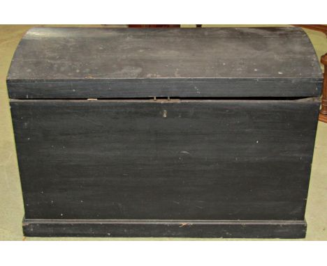 A painted pine coffer with arched outline with iron carrying handles, 84 cm wide together with a wooden and fibre lathe bound