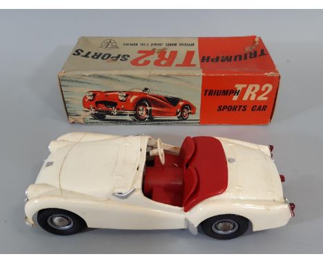 Boxed Triumph TR2 Sports Car 1:18 scale powered by 'Mighty Midget Electric Motor' by Victory Industries, in white with red se