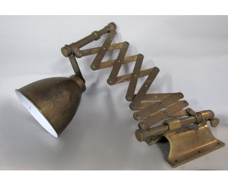 A good quality vintage industrial brass telescopic scissor wall lamp, with brass shade and wall bracket 