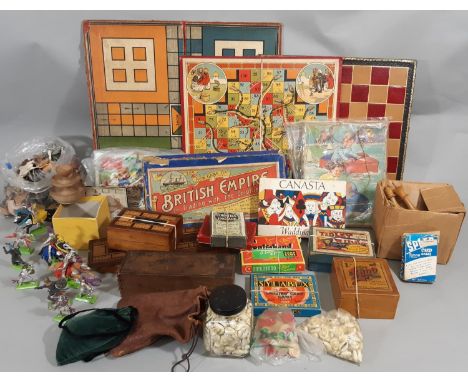 Boxful of vintage games and model figures including chess, dominos, cribbage boards, Britains 'Deetail' figures of medieval k