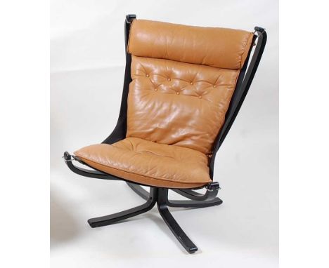 Sigurd Ressel (1920-2010) for Vatne Møbler - a 1960s ebonised 'Falcon' chair, of formed laminate construction, with tan leath