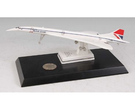 A contemporary Royal Worcester porcelain model of the First Flight of Concorde, 21st January 1976, limited edition numbered 1