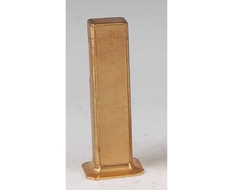 A Dunhill gilt metal 'Tallboy' table lighter, having engine turned decoration, with hinged cover, stamped marks verso, h.11cm
