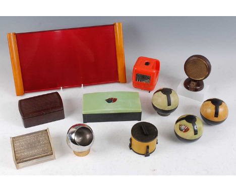 A collection of various bakelite and other table top effects, to include; three various globe shaped 'Tennis' ashtrays by Roa