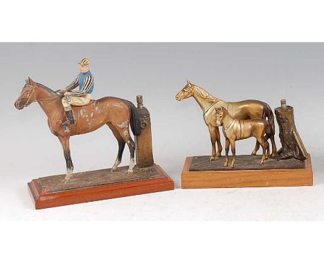 An early 20th century painted spelter novelty table lighter modelled as a horse and jockey, beside a winning post, raised on 