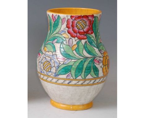 Charlotte Rhead for Crown Ducal - a 1930s pottery vase, of mid-bulbous ribbed form, underglaze bright colour floral stylised 