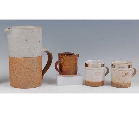 Robin Welch Pottery - a large studio pottery water jug, partially glazed and of slightly ribbed circular form, printed mark R