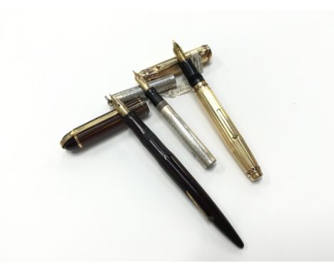 A rare vintage Wahl Eversharp Coronet fountain pen in Rolled Gold with integrated pink pearl design with 14k gold nib togethe