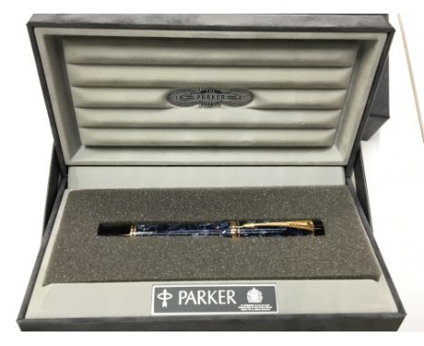 A Parker Centennial fountain pen in Blue Mottled colour fitted with an 18k broad (B) gold nib in the original box and papers 