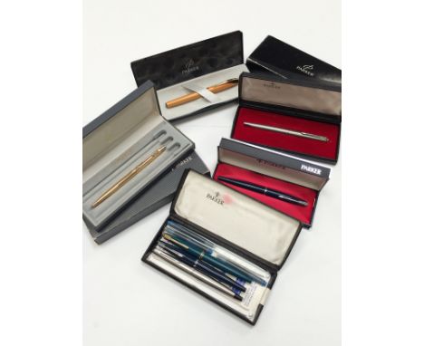 A selection of boxed Parker pens to include a Parker Inflection sun yellow fountain pen, five Parker 45s and a gold coloured 