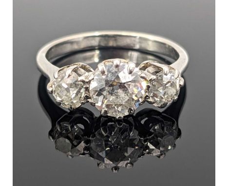 WHITE METAL THREE-STONE DIAMOND RING the three old cut stones measuring 1.3cts overall approx., ring size O, 3.9gmsProvenance