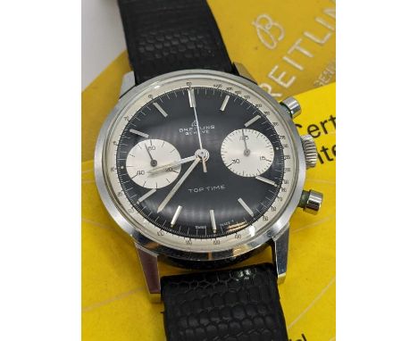 BREITLING TOP TIME 'THUNDERBALL' CHRONOGRAPH WRISTWATCH, ref. 2002, stainless steel, circa 1965, black reverse panda dial wit