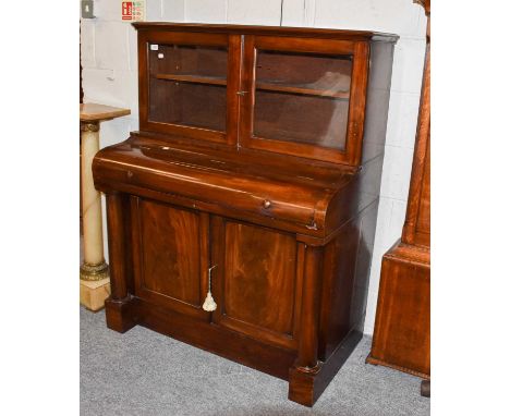 A Mahogany Desk Converted From a 19th Century Upright Piano, now with two glazed doors opening to reveal and shelf interior, 