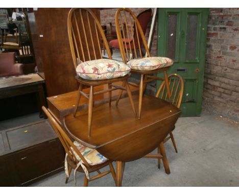 ercol dining table & 4 chairs ( one as found)