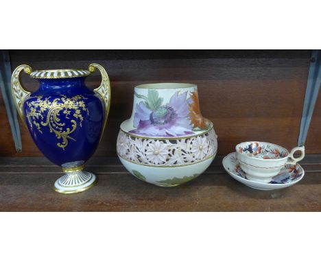 A Doulton Lambeth Carrara vase, firing crack, a Royal Worcester two handled vase, lacking lid, signed Roberts and an Imari cu