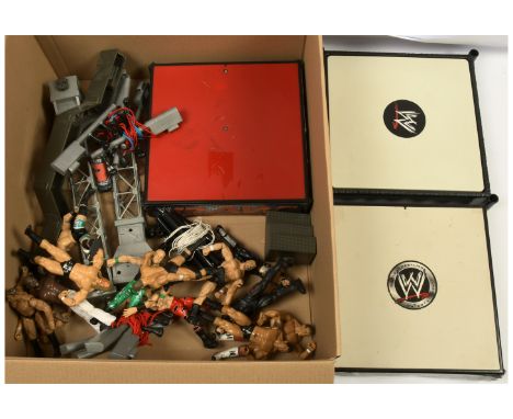 Quantity of loose WWE action figures X15 with Wrestling Ring x3 includes Triple H, Hardcore Holly, The Rock with others. Fair