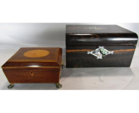 A Regency mahogany silk Lind jewellery box with satinwood inlay and lion mask handles , raised on lion paw feet 20cm wide, an