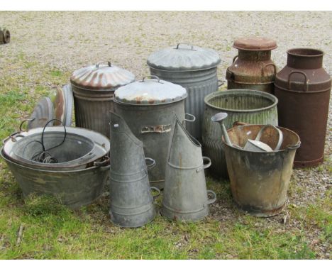 Two vintage weathered heavy gauge milk churns together with a selection of galvanised wares including an old dolly tub, vario