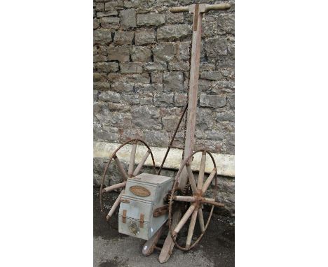 Local interest - a vintage Kell &amp; Co Ltd, Gloucester seed drill with T shaped handle, wooden spoke wheels and iron rims, 