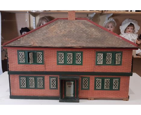 Large hand built vintage wooden dolls house with sliding sections on front and rear walls allowing access to interior. 1960's