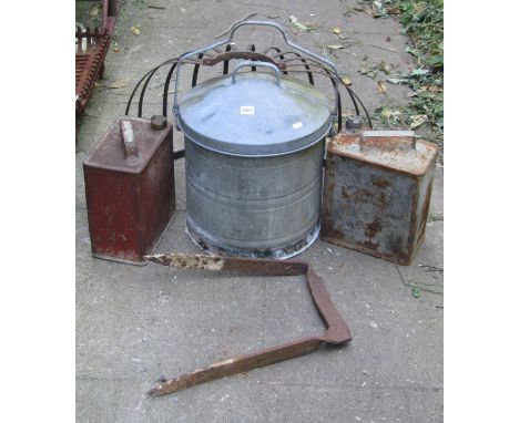 A vintage galvanised cylindrical bin with domed lid and loose loop handle together with a vintage iron boot scraper, strap wo