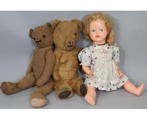 Two vintage teddy bears for restoration, both approx height 49cm together with a Palitoy walking doll with blue closing/ side