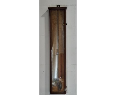 An Admiral Fitzroy's barometer in a plain timber case with original paper backing, thermometer, etc 