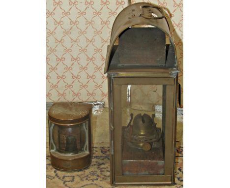 A small stern lantern in copper, 12 cm together with a further brass storm lantern 