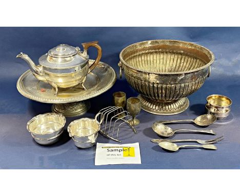 A large quantity of silver plated table ware, including a large oval tray, toast rack, vinaigrette stand, tea pot, loose flat