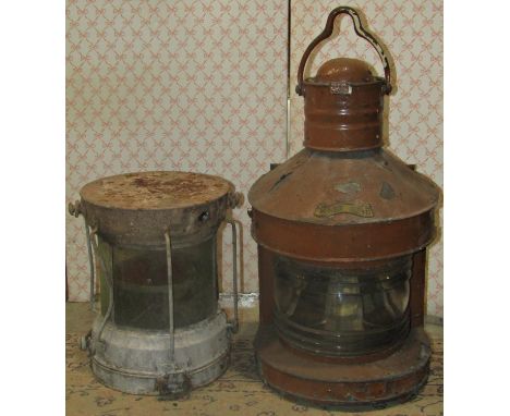 A marine mast head lantern with painted finish and a circular marine lantern 