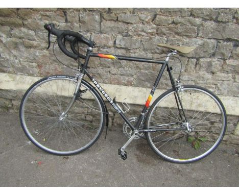 A vintage Peugeot lightweight racing cycle 12 speed with Brooks saddle 