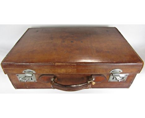 A vintage leather suitcase, with decent handle and stitching, working clasps  initialled I.M.C , 56cm wide x 36cm deep. 
