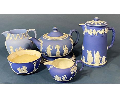 A collection of Wedgwood pale blue ground jasperware in the classical style, comprising teapot and stand, water jug, milk jug