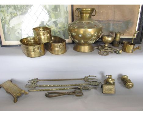 A collection of brass ware including three concentric oval planters, a miniature watering can, a miniature miner’s lamp, toas