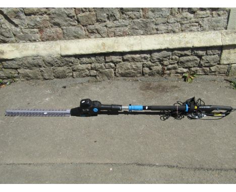 A Bosch electric hedge trimmer model AHS55-16, used but in original cardboard packaging, together with a further electric lon